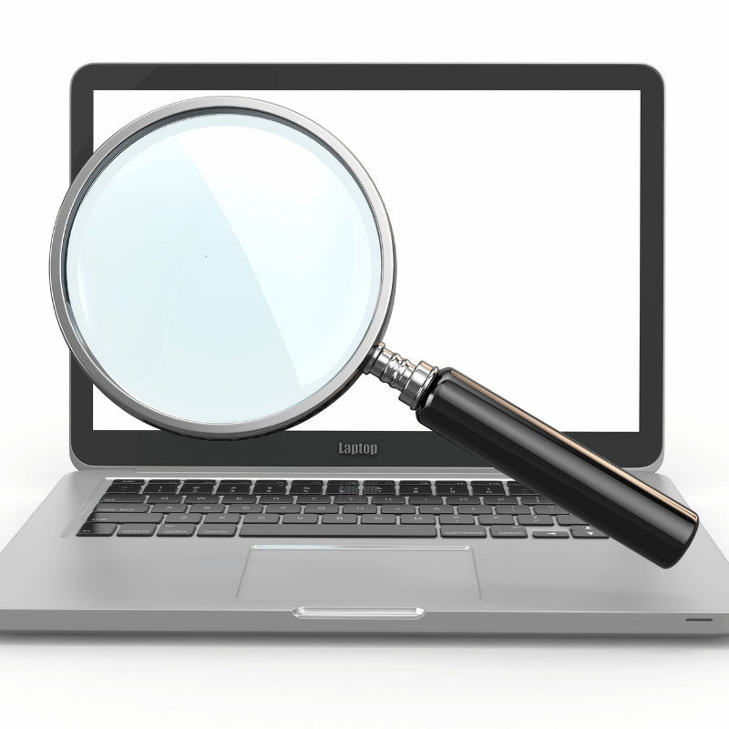 Is Your Website Ready for the New Accessibility Rules Magnifying Glass in Front of Laptop